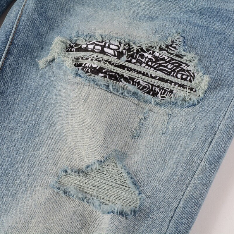 Sunder Ripped Jeans
