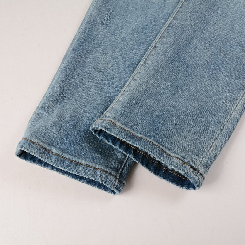 Sunder Ripped Jeans