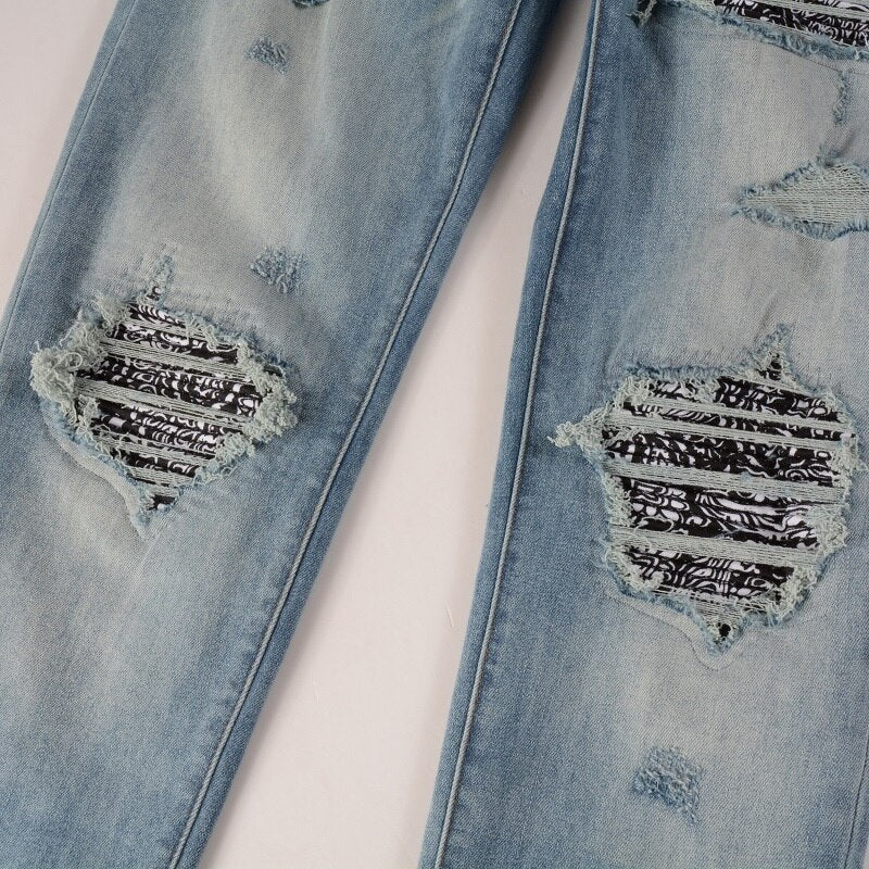 Sunder Ripped Jeans