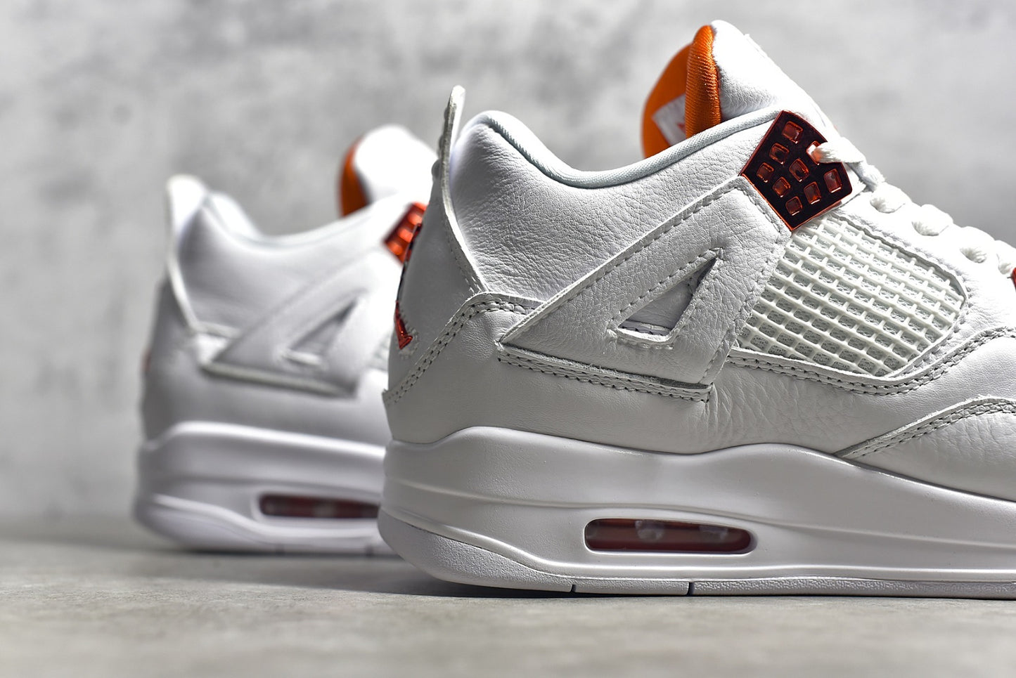 Jordan 4 Metallic Orange