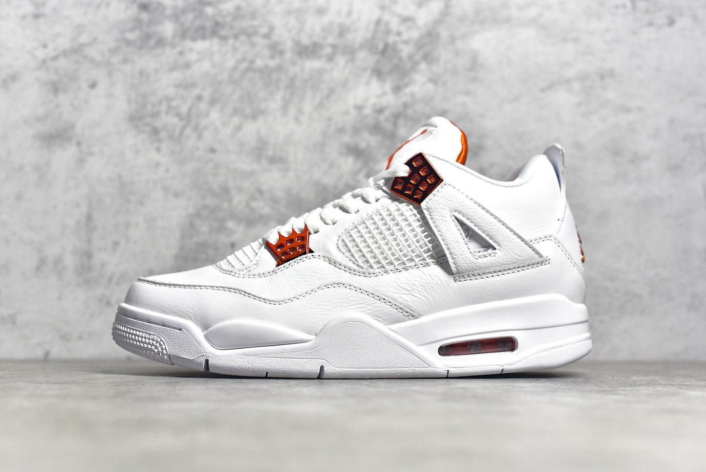 Jordan 4 Metallic Orange